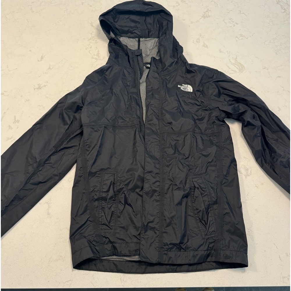 The North Face boy’s size 14/16 black rain jacket